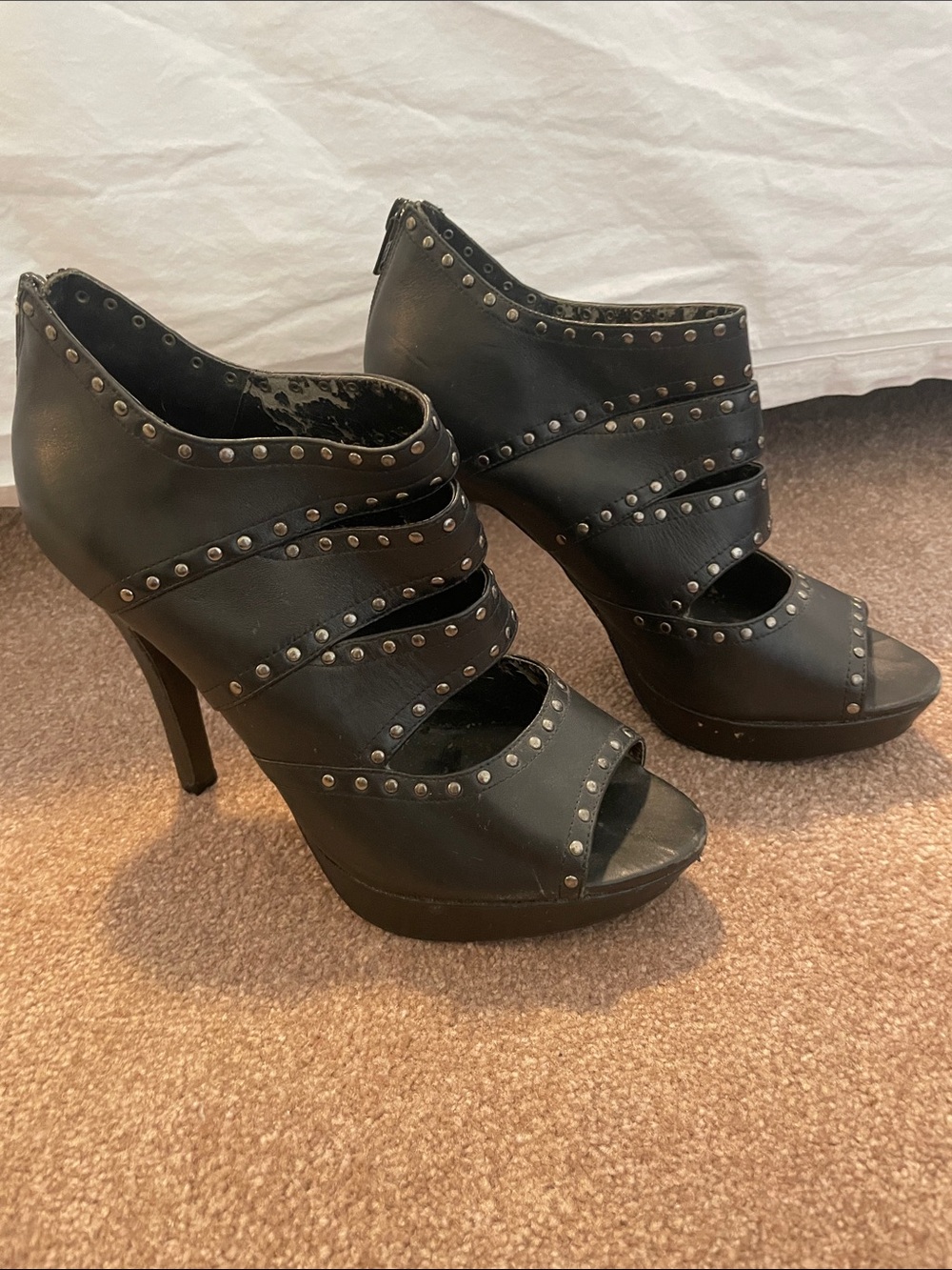 Aldo Black Studded Peep-Toe Platform Heels visible wear on the inside only.